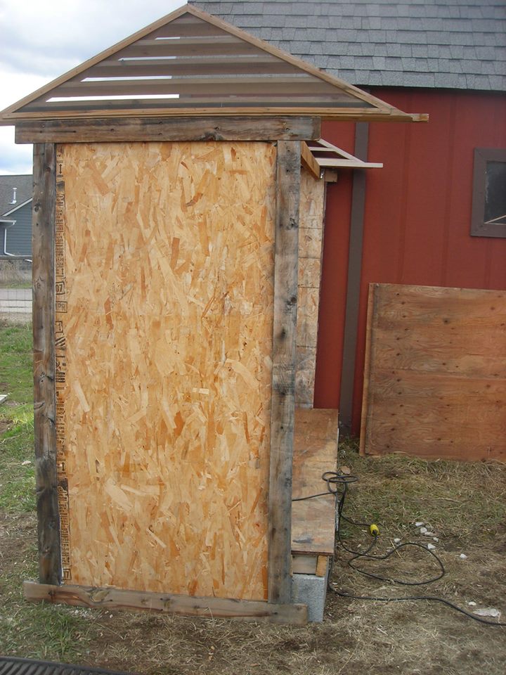 We decided to put the coop against the north side of our existing barn - to add stability but to also to provide shade from the intense summer sun.  I don't think I have a picture of it, but we eventually put a small window in this north facing coop wall, about 3 feet up.  It's a window from the back of a camper truck, so half if it slides open.  We put wire over the outside of it and have left it open all summer.  Note that we put the roof vents up so that they overhang on the west side - this helps to keep the rain from pouring down right over the entrance to the coop.