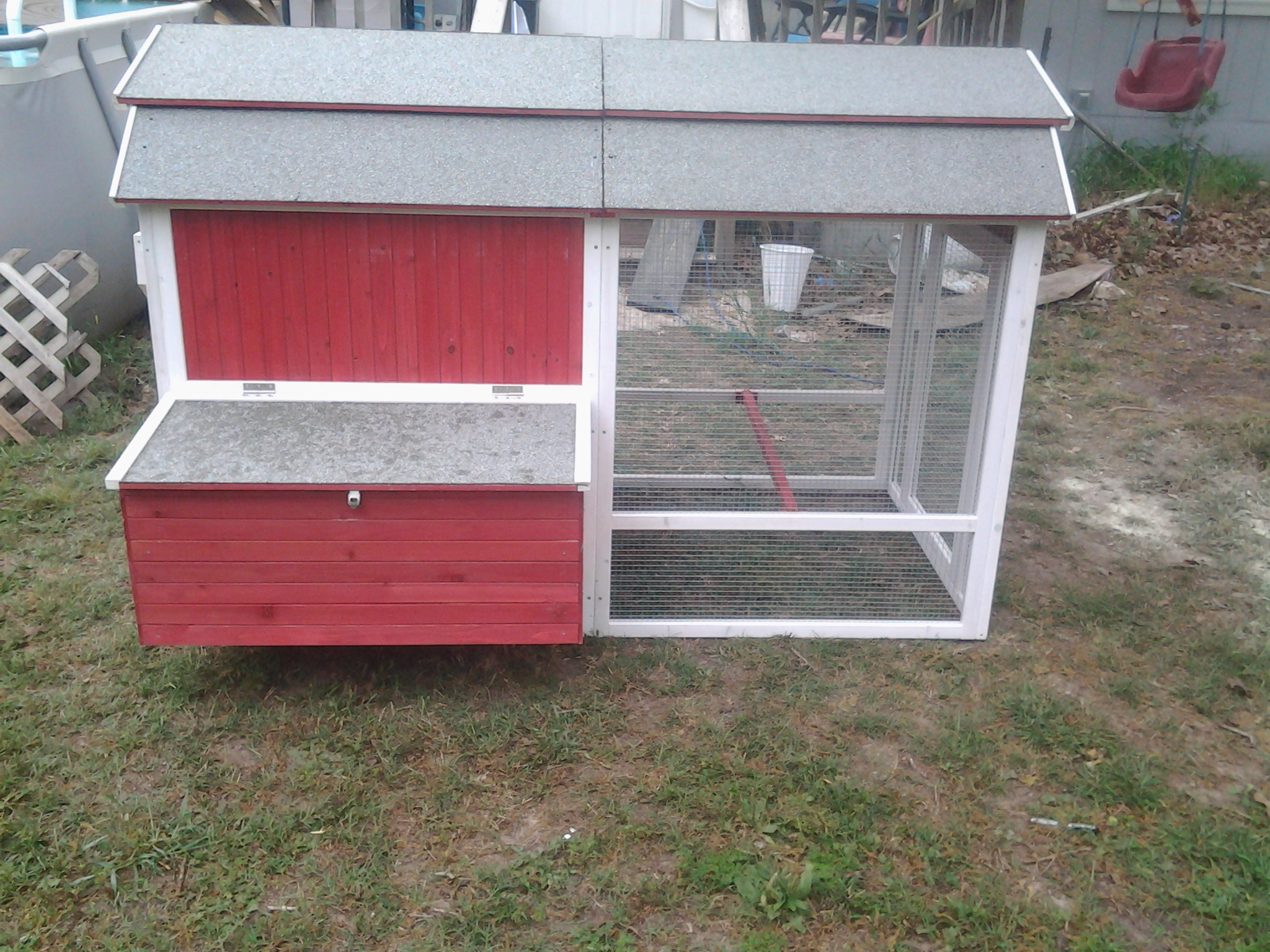 We kept  the laying boxes instead of closing this off as it would give the Chicks a place for them to get up off the ground if it was too cold or wet.