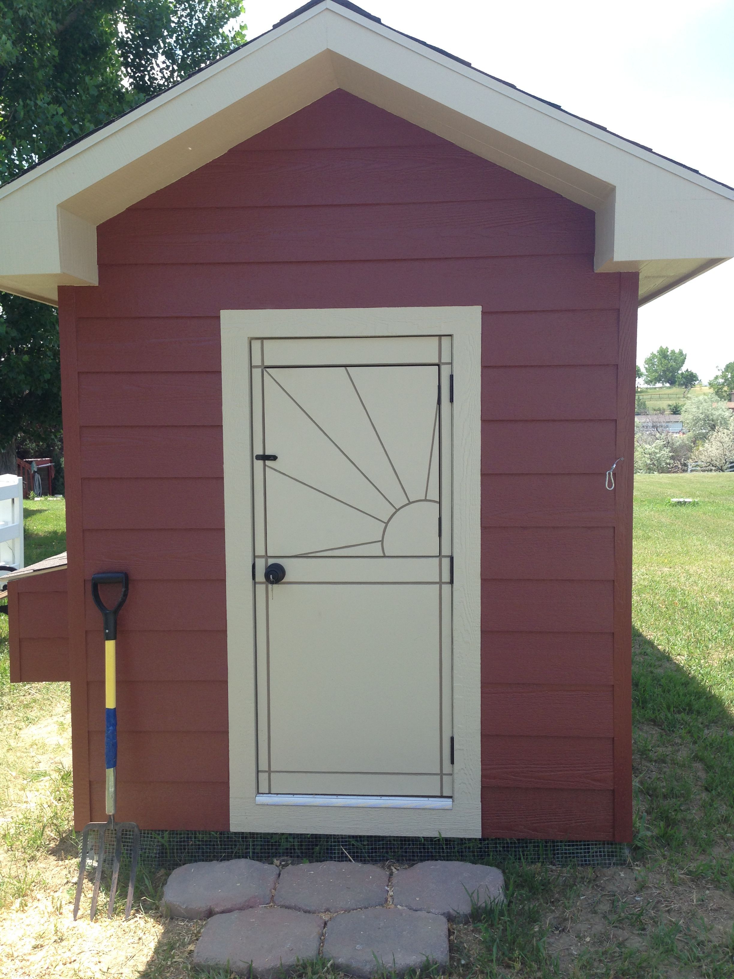We made the door, as it is smaller than a standard sized door.  This allowed us to make a faux dutch door and add a little flare by cutting the sun into it.