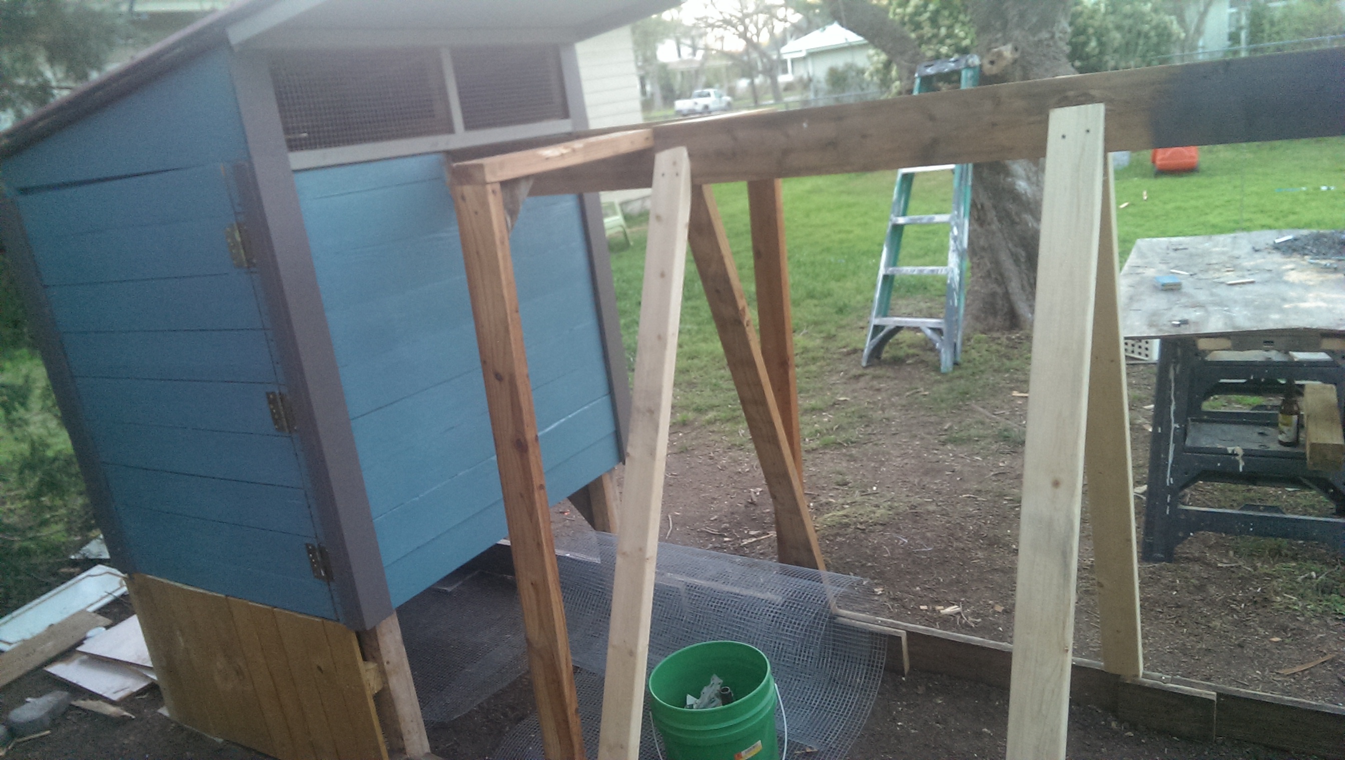 We put siding on the back to create a little sheltered corner underneath for the chickens.