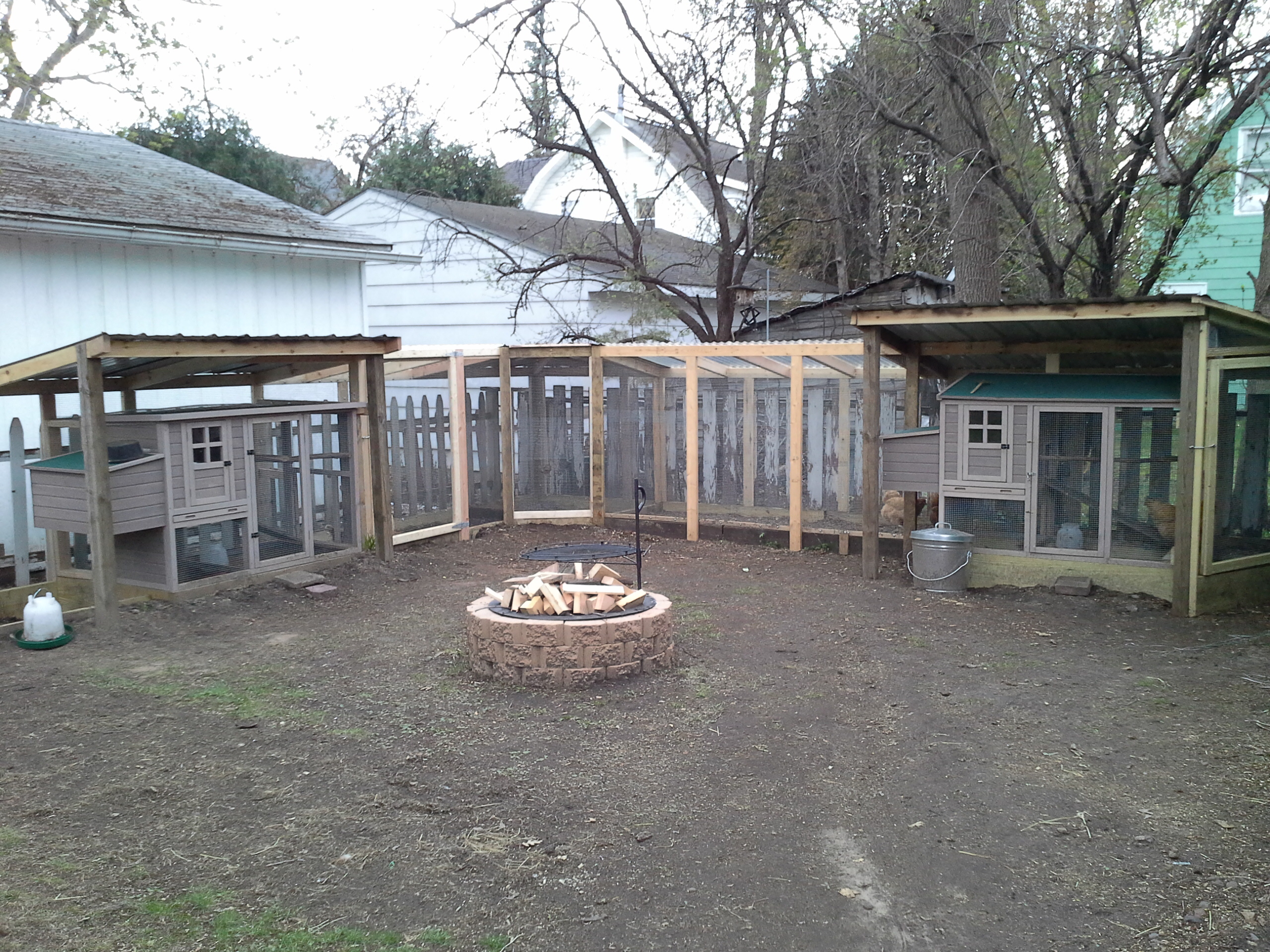 We wanted to attach runs to the chicken coops we had, this was our solution!  DH started telling his friends we don't have a chicken house, it's a Palace!  It is probably more structurally sound than our house!