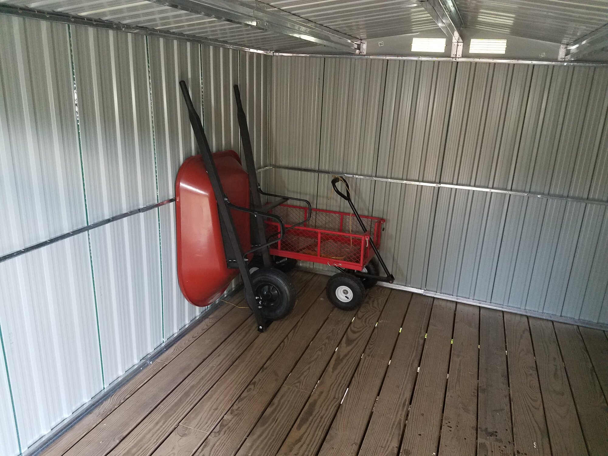 Wheelbarrow and Garden cart inside