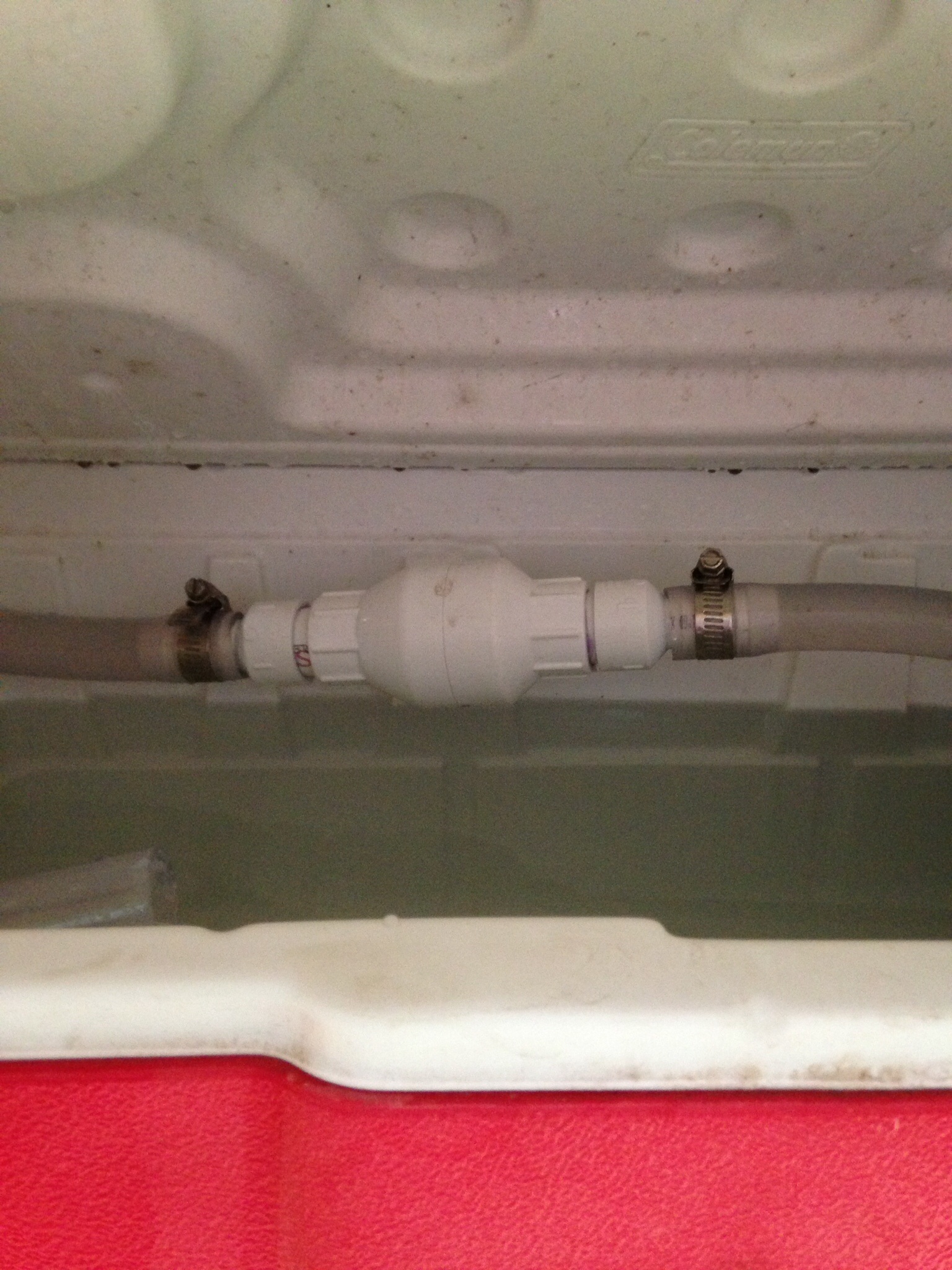 Working the bugs out. I added a check valve to the watering system.