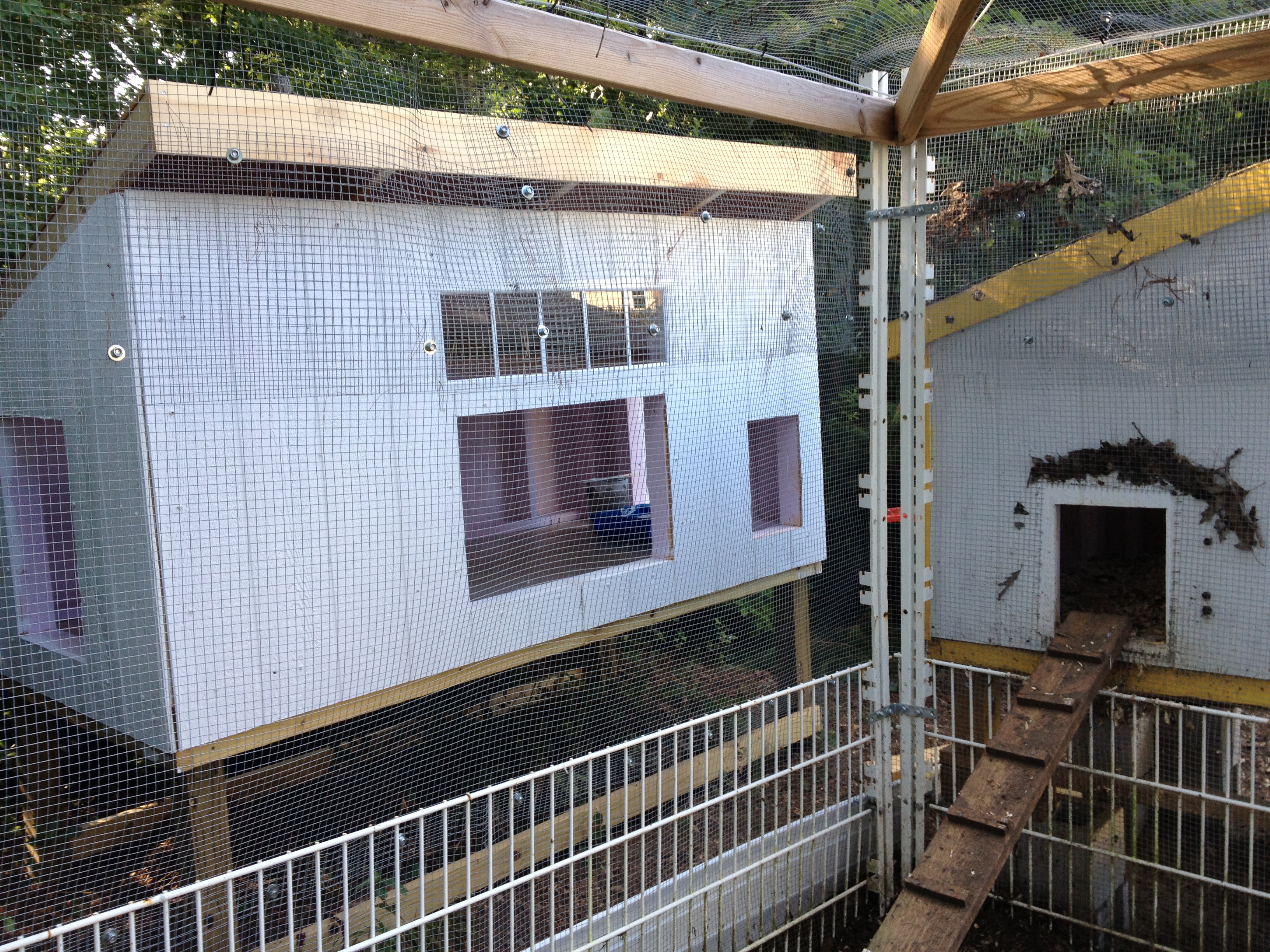 you can see the run and the existing coop in front