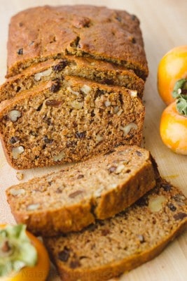 This Persimmon Bread Recipe is a keeper (in a make again and again sort of way)! Soft, moist, and every slice is studded with walnuts and raisins | natashaskitchen.com