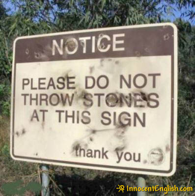stupid-signs-throw-stones.jpg