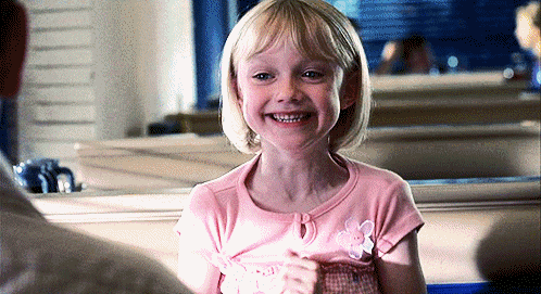 Dakota-Fanning-Excited-Smile-Reaction-Gif.gif