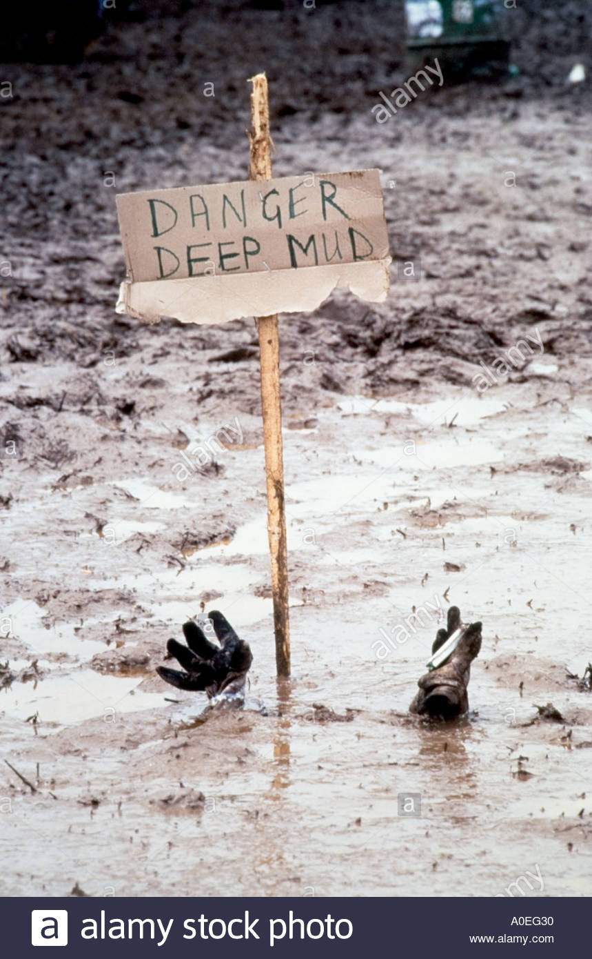 glastonbury-festival-joke-danger-sign-in-the-mud-A0EG30.jpg