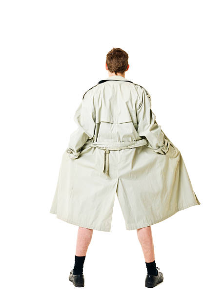 lone-flasher-in-a-khaki-trench-coat-picture-id159348241