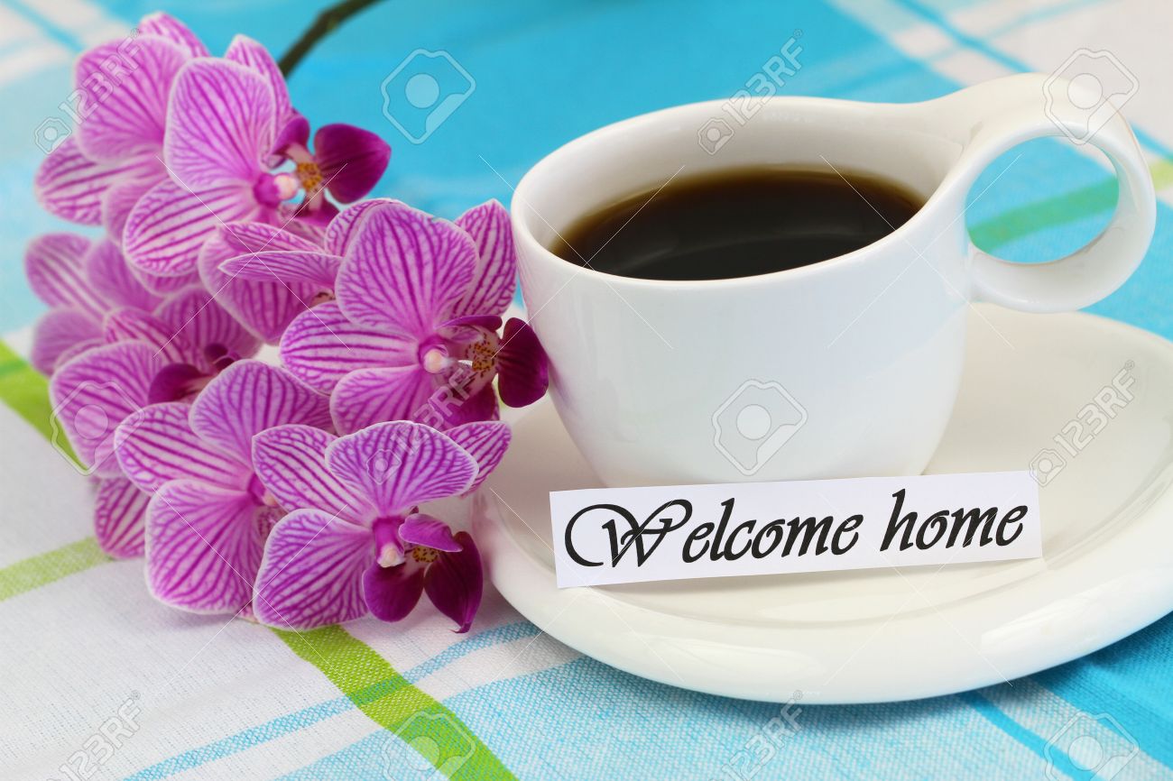 38387850-Welcome-home-card-with-cup-of-coffee-and-pink-orchid-Stock-Photo.jpg